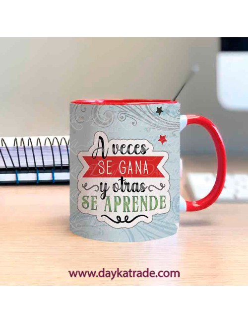 Taza pintada frase "a veces se gana y otras se aprende"